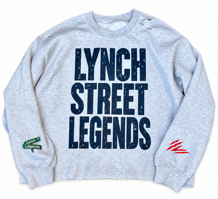 Vintage distressed light grey sweatshirt with raw hem, navy distressed Lynch Street Legends chest lettering, green Lynch Street sleeve sign, and red sleeve graphic
